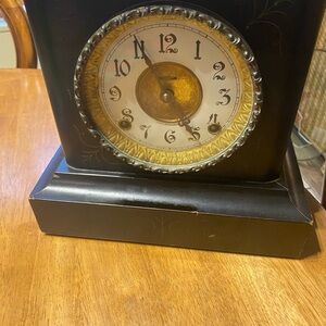 Antique E Ingraham clock. 1800/1900s. Has key. Clock is not in working order